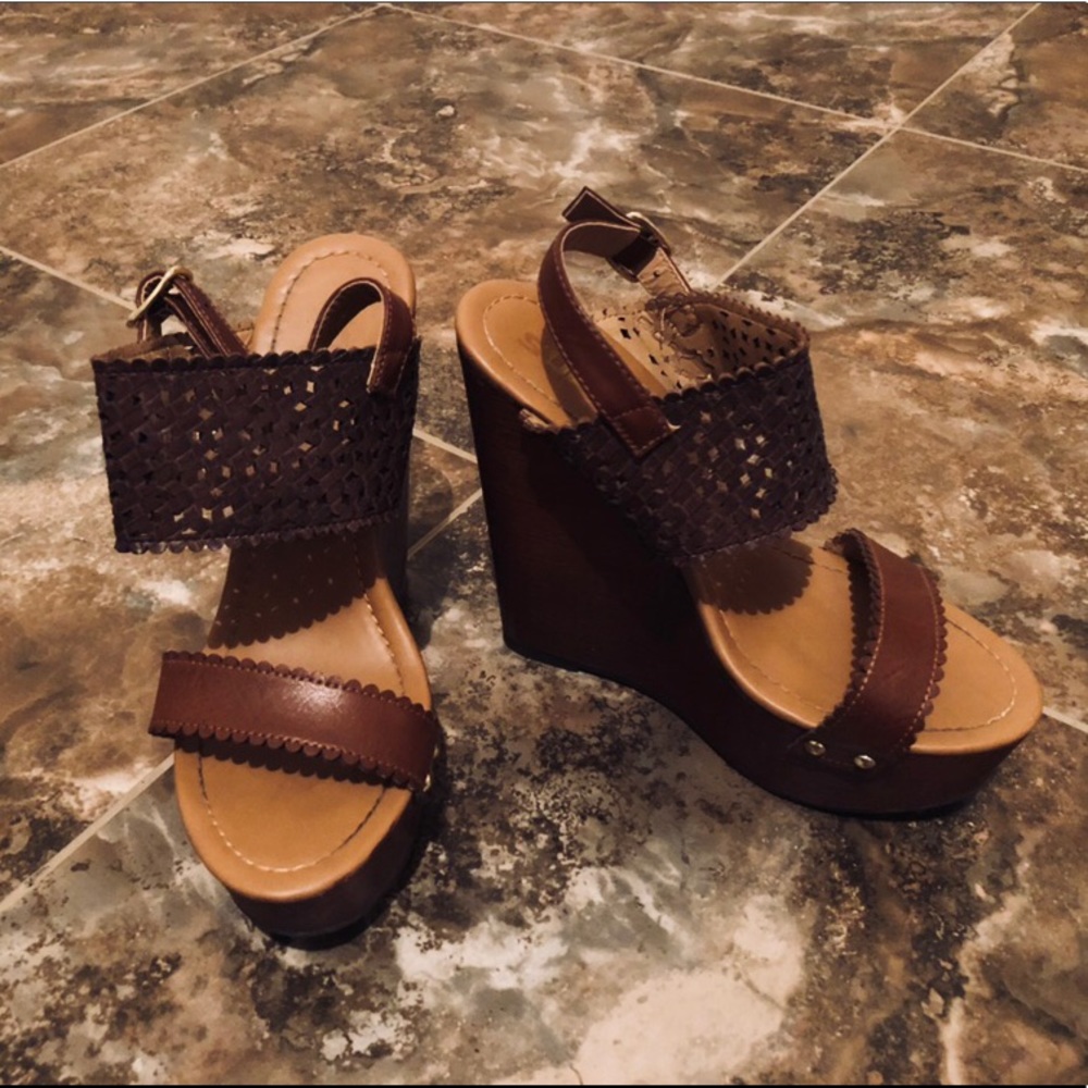 Brown strapped up heels